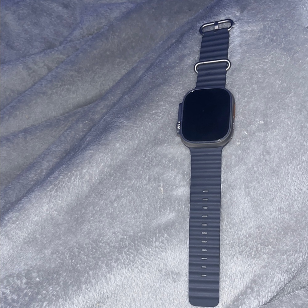 Black screen silver platform Smartwatch with blue Silicone Band